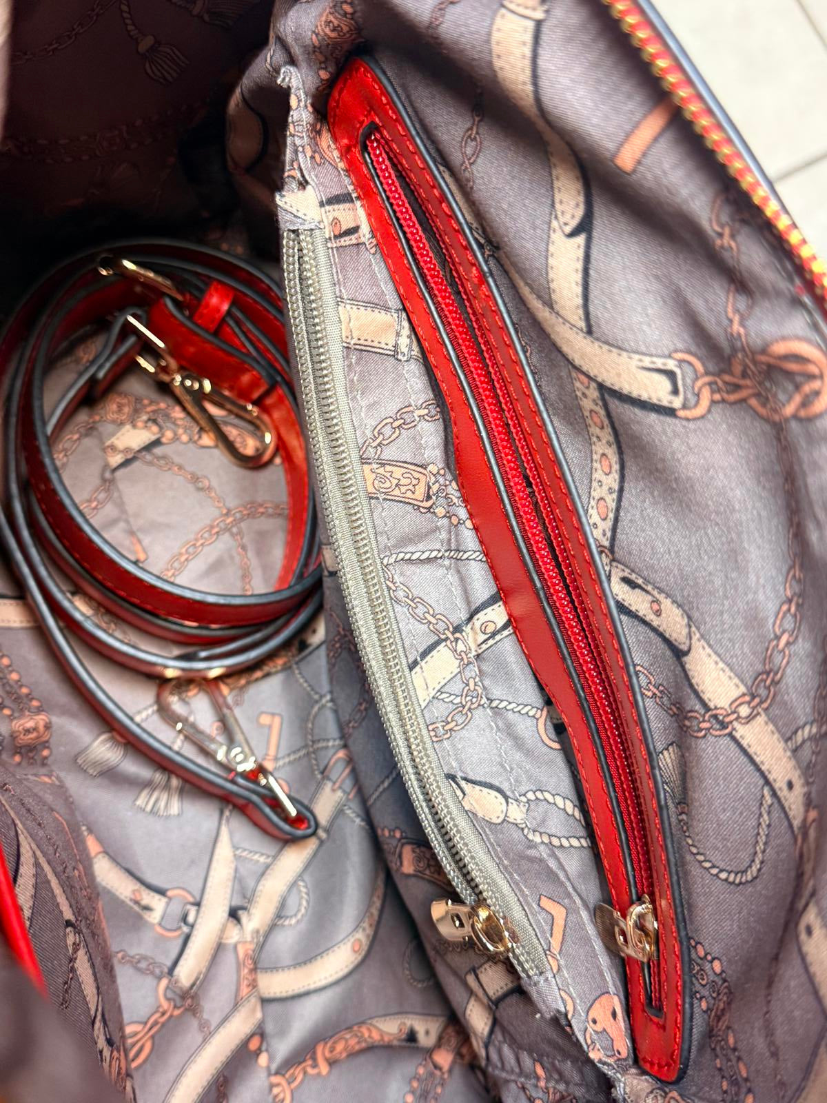 Elegant Red Leather Handbag with Chain Print Interior
